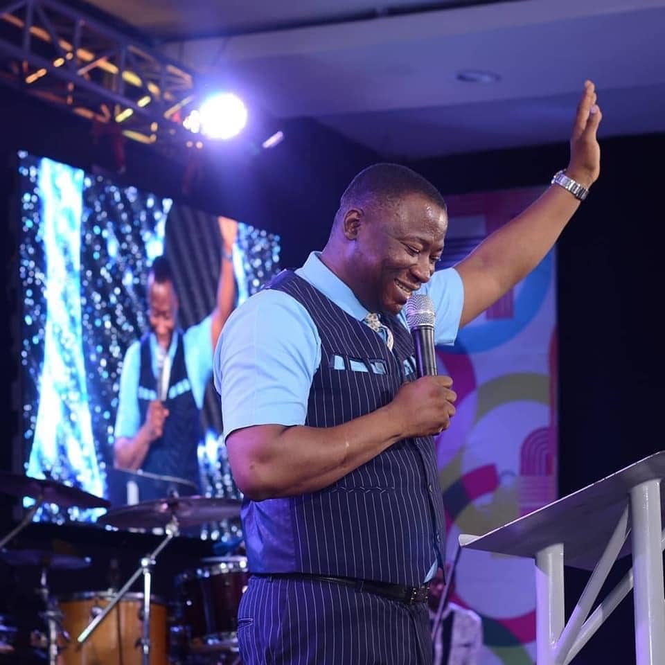 Rev. Victor Atenaga ministering in worship